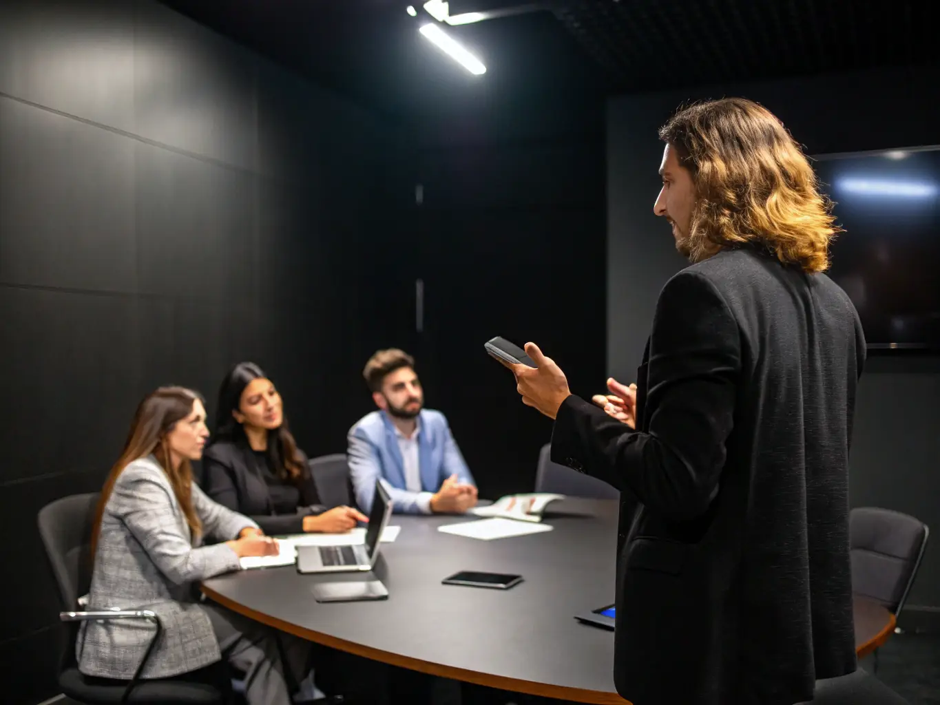 A dynamic image of a business coach leading a session on leadership skills, emphasizing communication and team motivation.